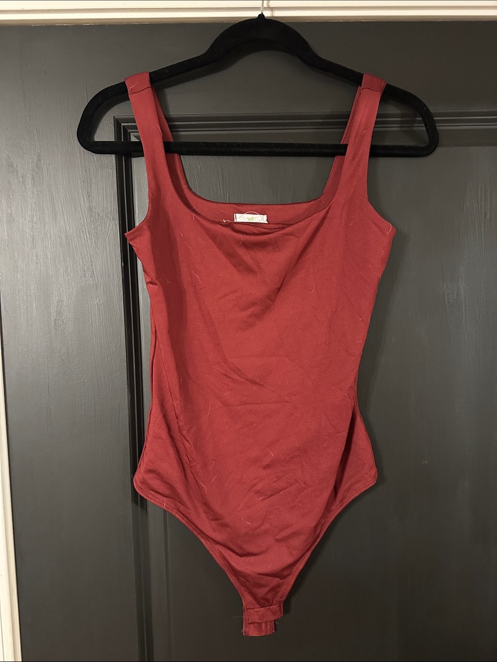 Women’s Red One-Piece Bodysuit